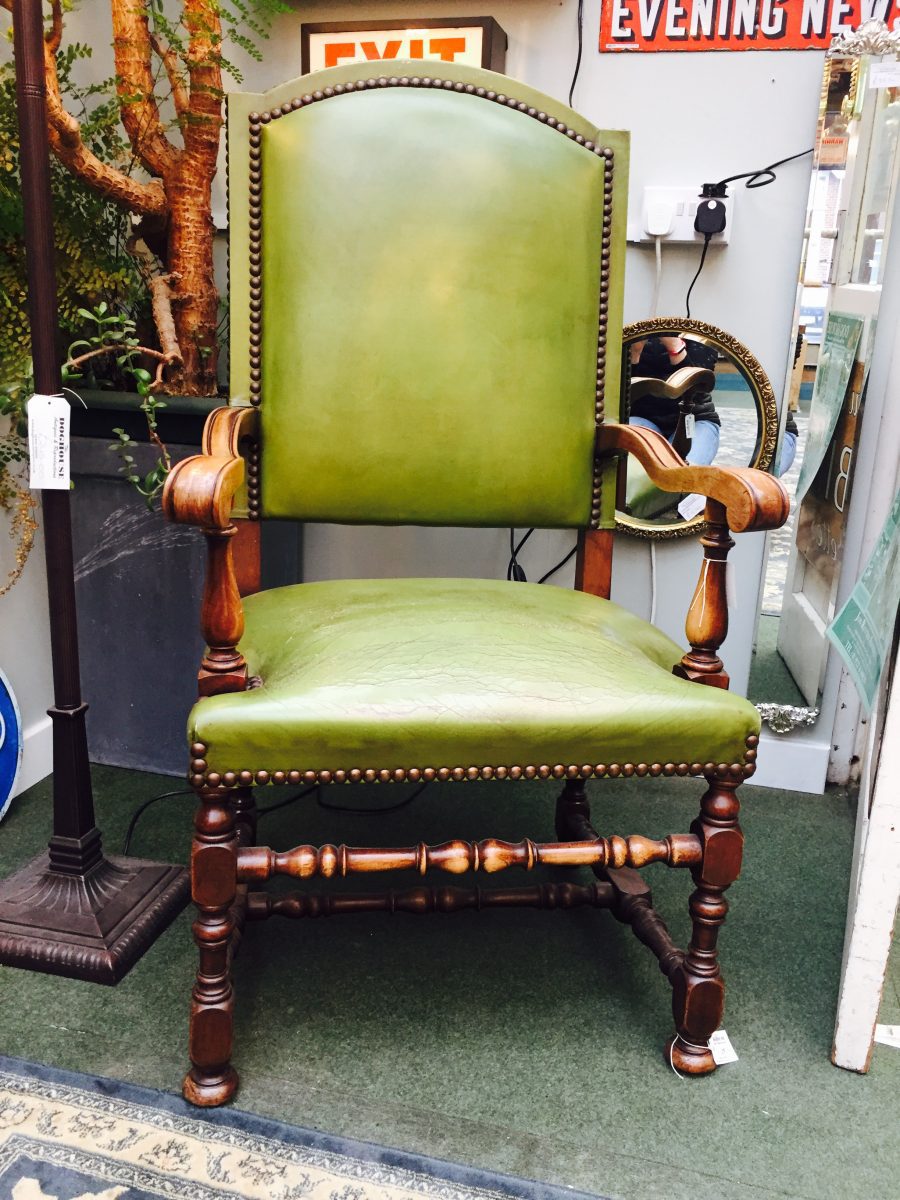 The Dog House Antiques Green Leather Arm Chair.